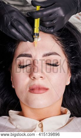 Brunette Girl In Cosmetology Office During Plasmolifting Procedure Lying With Closed Eyes