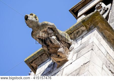Lime Sandstone Gargoyles At St. Peter\'s Cathedral In Regensburg, Photographed In Spring