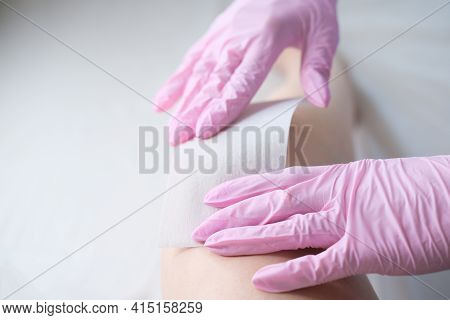 Waxing Salon Or Spa. Hair Removal Using Wax.Concept - sugar paste or hair removail.