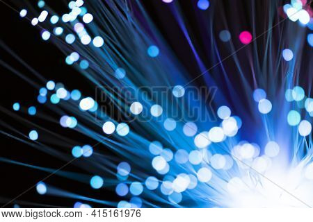 Blue Fiber Lights With Defocused Spots. High Quality And Resolution Beautiful Photo Concept