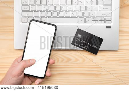 Online Paying Shopping, Electronic Payment With Credit Card, Cell Phone Mockup, Laptop Over Wooden T