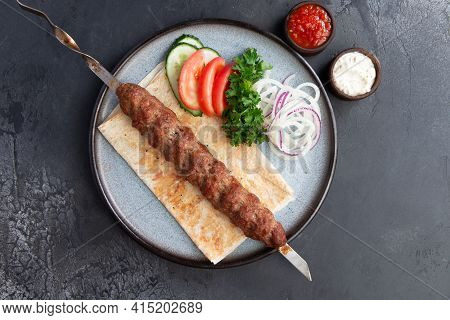 Kebab On A Skewer In A Plate.