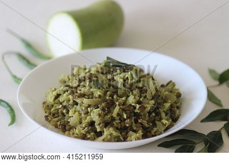 Stir Fried Bottle Gourd And Green Gram. A Dish Made With Chopped Vegetables And Pulsed Grated Coconu