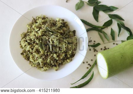 Stir Fried Bottle Gourd And Green Gram. A Dish Made With Chopped Vegetables And Pulsed Grated Coconu