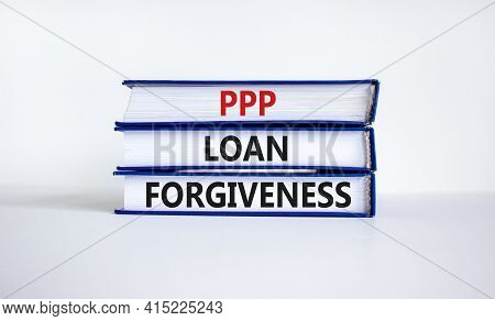 Ppp, Paycheck Protection Program Loan Forgiveness. Concept Words Ppp Loan Forgiveness On Books On Wh
