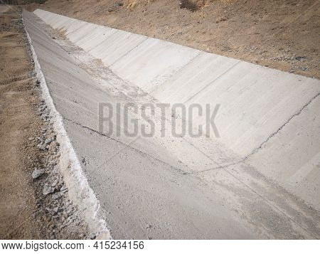 Concrete Rain Water Drainage Tray At Construction Site. Rain Water Drainage Gutter. Concrete Structu
