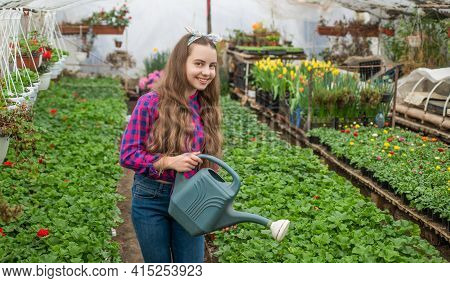 Summer Farm. Horticulture. Gardening Activity For Kid. Happy Teen Girl Florist In Greenhouse.