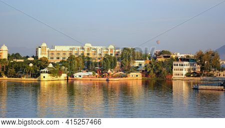 UDAIPUR, INDIA - November 4, 2015: Leela Palace Hotel Lake Pichola. The hotel is a jewel on the banks of Lake Pichola offering stunning views of the lake, City Palace and the Aravalli mountains.
