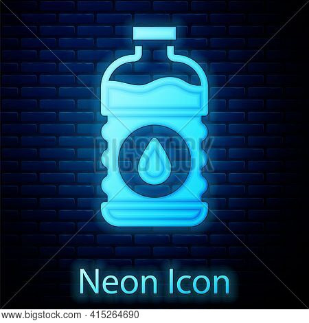 Glowing Neon Bottle Of Water Icon Isolated On Brick Wall Background. Soda Aqua Drink Sign. Vector
