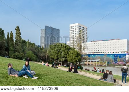 Sabadell - Catalonia, Spain - April 1st Of 2021: View Of The Parc Catalonia With People Laying On Th
