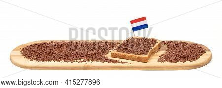 Typical Dutch Chocolate Sprinkles (hagelslag) On A Slice Of Bread, Served On A Wooden Plate, Isolate