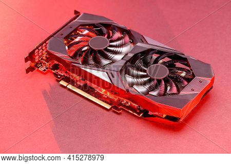 Graphic Video Card  With Red Backlight. Gpu Card. Mining Cryptocurrency Concept