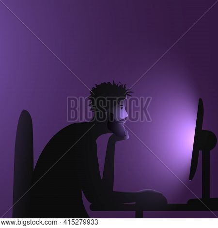 Internet Addiction. A Black Man With An African Hairstyle And Beard Sits At A Computer Late At Night
