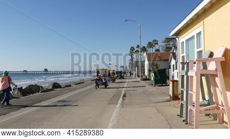 Oceanside, California Usa - 16 Feb 2020: People Walking Strolling On Waterfront Sea Promenade, Beach