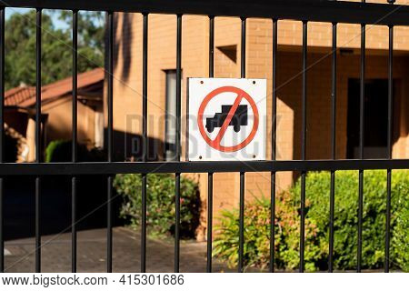 No Truck Sign On A Metal Fence Of Residential Buildings Area