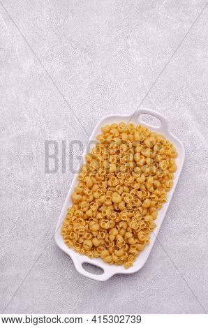 Traditional Dry Pasta On A Light Gray Background. Design Concept. A Copy Of The Space. Selective Foc