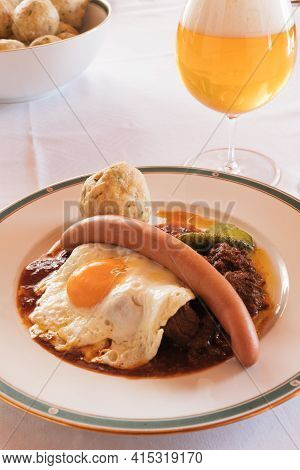 Fiakergulasch Or Herrengulasch Viennese Beef Goulash Garnished With A Bread Dumpling, Frankfurt Saus