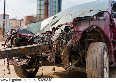 Close Up Of Broken And Abandoned Car. Smashed Car To Pieces After Accident On Street. Concept Of Car
