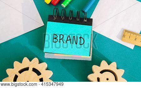 Notes With Inscription Brand. Business, Marketing, And Advertising. Name, Term, Design, Symbol That 