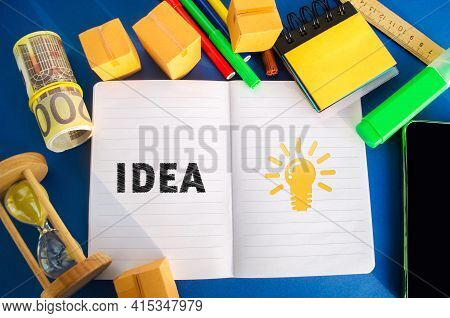 Notebook With Word Idea And Light Bulb Idea Icon. Concept Of New Innovation Ideas And Discoveries. V