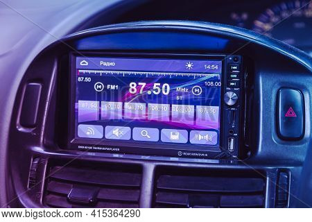 Novosibirsk, Russia - April 01 2021: Toyota Estima, Audio Stereo System, Control Panel  Under Pink N