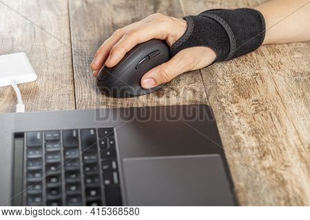 Chronic Trauma To The Wrist Joint  In People Using Computer Mouse May Lead To Disorders That Cause I