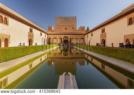 Granada, Spain 07-12-2010: Alhambra Palace Complex Reflection Pool With The Reflection Of The Palace