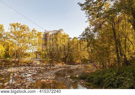 View From The Bridge Over Patapsco River At Ellicott City,md In Autumn. Image Features The River Wit