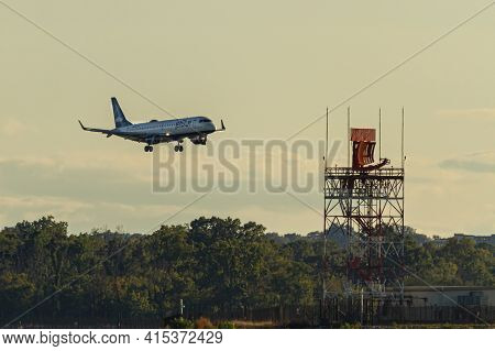 Washington Dc, Usa 10/03/2020: An Airbus A321 Airplane By Jet Blue Airlines Is Landing Descending To