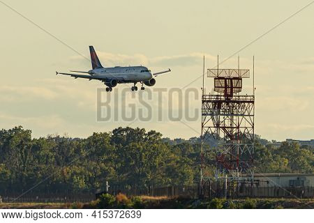 Washington Dc, Usa 10/03/2020: An Airbus A321 Airplane By Delta Airlines Is Landing Descending To La