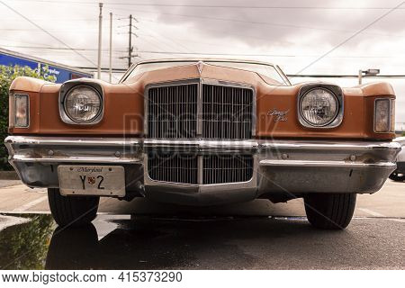 Rockville, Md, Usa 09/12/2020: Front View Of An Old, Orange, Rusty Pontiac Grand Prix.  This Is A Th