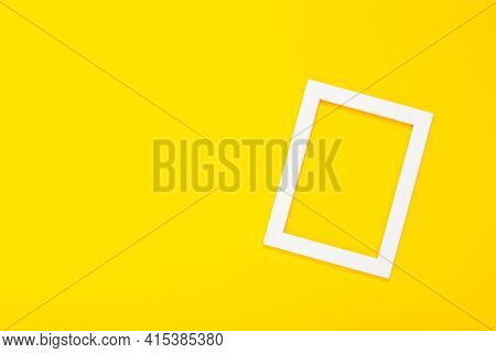 Banner With Blank White Photo Frame On Yellow Background With Copy Space, Free Text Place. Framing W
