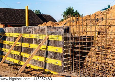 The Construction Of A Retaining Wall Or Counterfort, Formwork, Reinforced, Preparation To Pour Concr