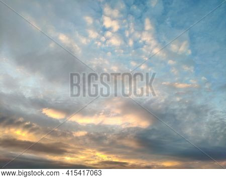 Beautiful Sky With Clouds At Sunset. Panoranic Sunset Sky With Colorful Clouds
