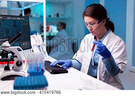 Professional Doctor Scientist Holding Vacutainer Blood Sample