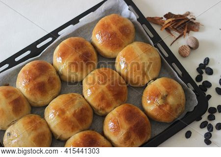 Freshly Baked Hot Cross Buns. A Sweet Fruit Bun Lightly Spiced With Cinnamon And Nutmeg And Marked W