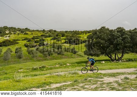 Adullam, Israel - March 18th, 2021: A Man Riding A Bicycle On A Nature Trail In The Adullam Region O