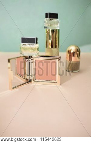 Balans Composition And Set Of Decorative Cosmetics, Blush, Perfume, Foundation On A Green And Pink B