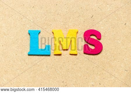 Color Cloth Alphabet Letter In Word Lms (abbreviation Of Learning Management System) On Wood Backgro