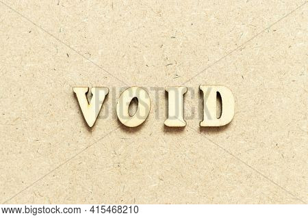 Alphabet Letter In Word Void On Wood Background