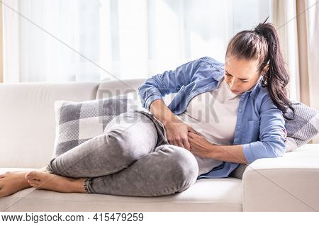 Detail Of A Woman In Pain Of Abdominals, Gallbladder, Ovaries, Appendix, Liver Or Intestines Holding