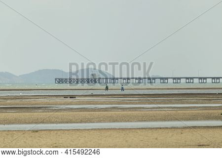 Fisherman's Fishing Boat On Sand At A Fishing Village Beach There Is An Island And Sea Background Wi