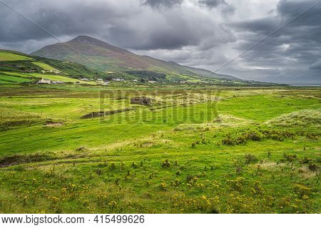 Slieve Mish Mountains And Green Meadow Seen From Dunes Of Inch Beach A Scenic Section Of Wild Atlant