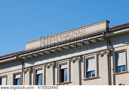 Close Up Of A School Building With The Italian Inscription Scuole Comunali (english Municipal School