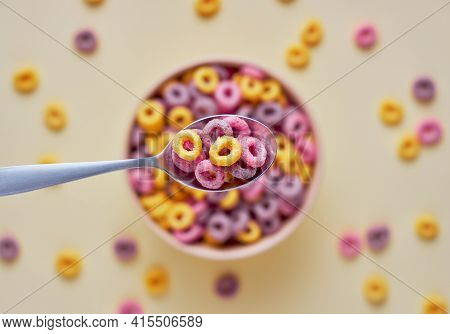 Colorful Fruit Cereal Loops In A Bowl On A Light Background.