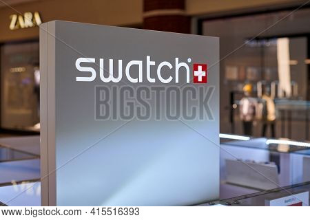 Russia, Kaliningrad - 02.15.2021 - Swatch, Sign With Logo Lettering Of Swiss Watches At Store Displa