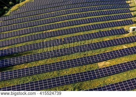 Solar Panels In Aerial View. Power Farm Producing Clean Energy.