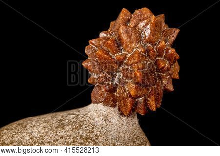 Macro Stone Ikaite Mineral In Rock On A Black Background