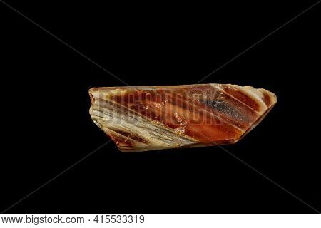 Macro Of A Mineral Quartz Stone With Lepidokrokit On A Black Background