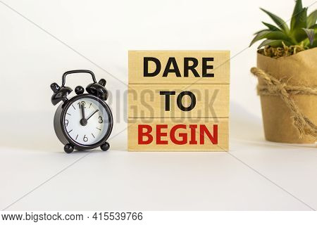 Dare To Begin Symbol. Wooden Blocks With Words 'dare To Begin'. Beautiful White Background, Black Al